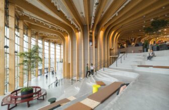 Henning Larsen’s World of Volvo Embraces Nature With A Timber Cover